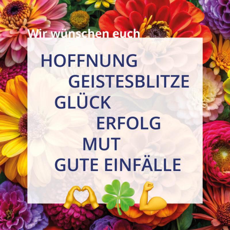 Viel Erfolg Wunsch mit Blumen im Hintergrund
